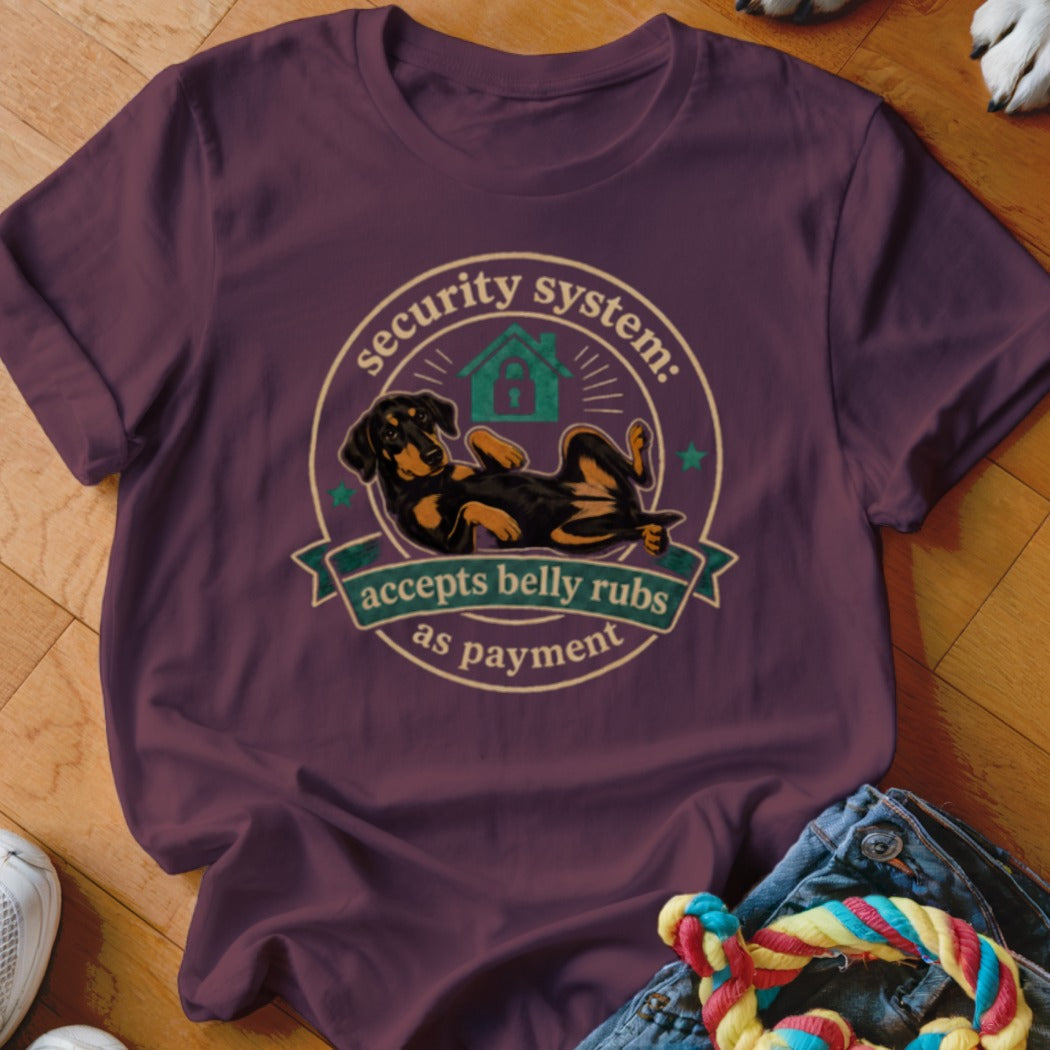 Maroon t-shirt with a graphic of a dachshund saying "security system: accepts belly rubs as payment".