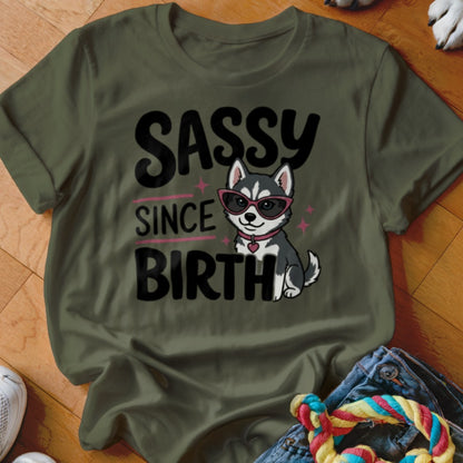 Green t-shirt with "Sassy Since Birth" text and a cartoon husky wearing sunglasses.