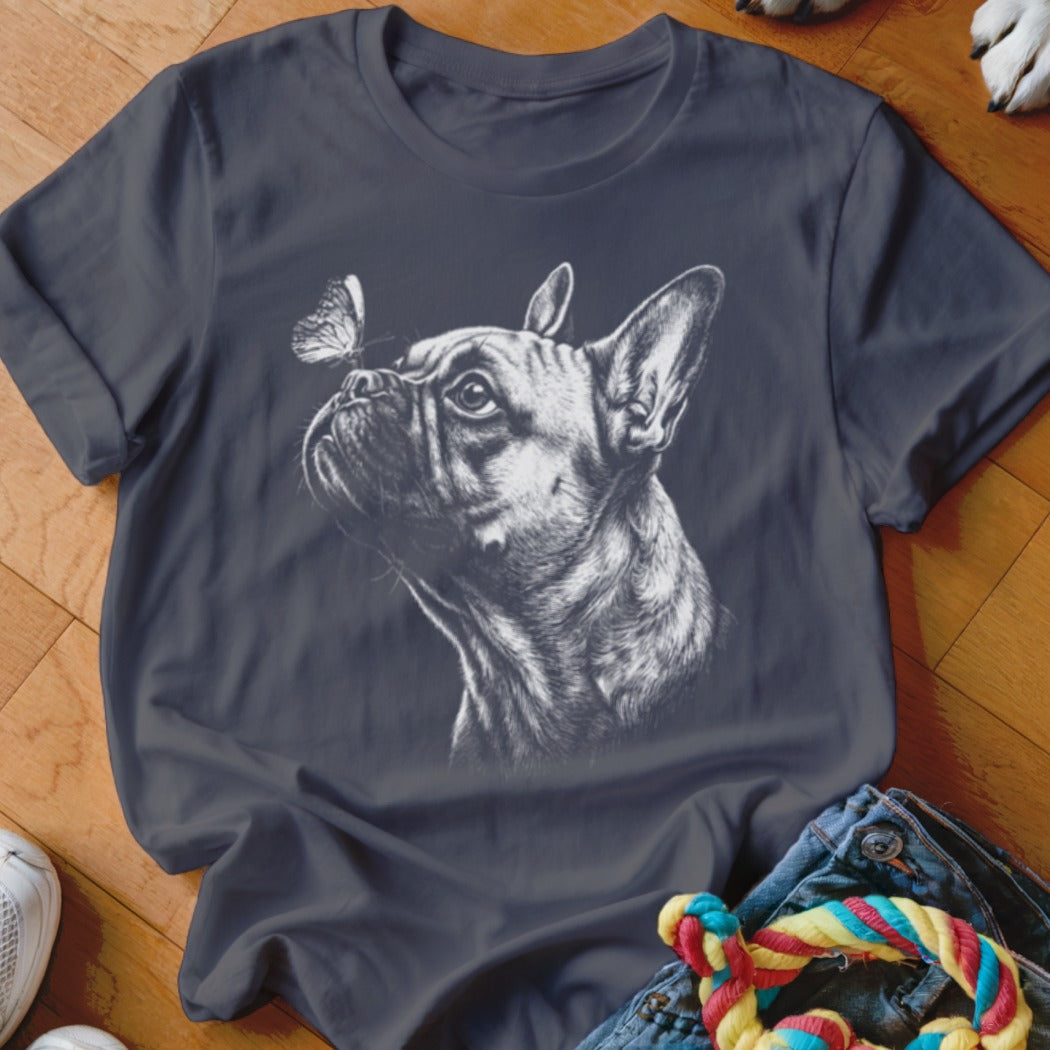 A dark grey crewneck t-shirt featuring a white sketch of a French bulldog and a butterfly.