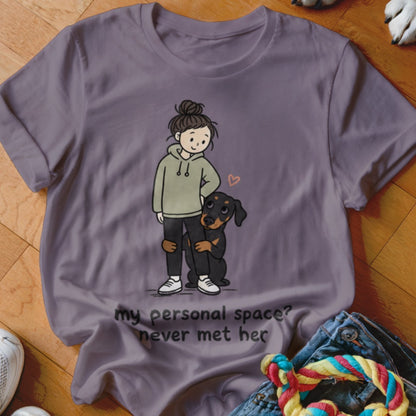 Girl with dog and text "my personal space? never met her" on t-shirt.
