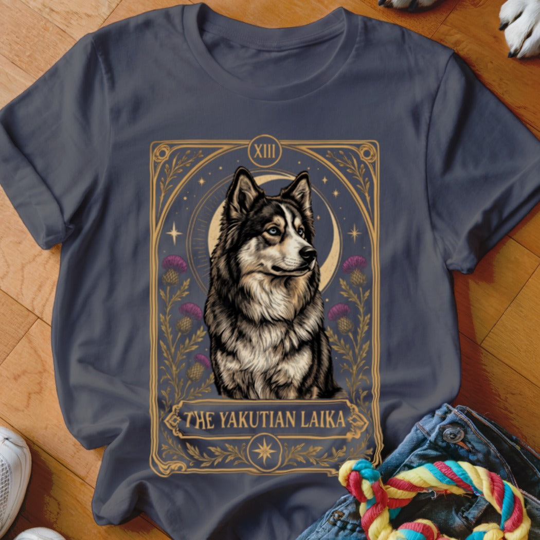 Dark gray t-shirt featuring a tarot card graphic of a Yakutian Laika surrounded by thistles and a crescent moon.