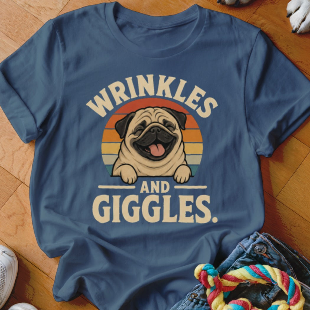 Blue t-shirt with a pug graphic and text that reads "WRINKLES AND GIGGLES."