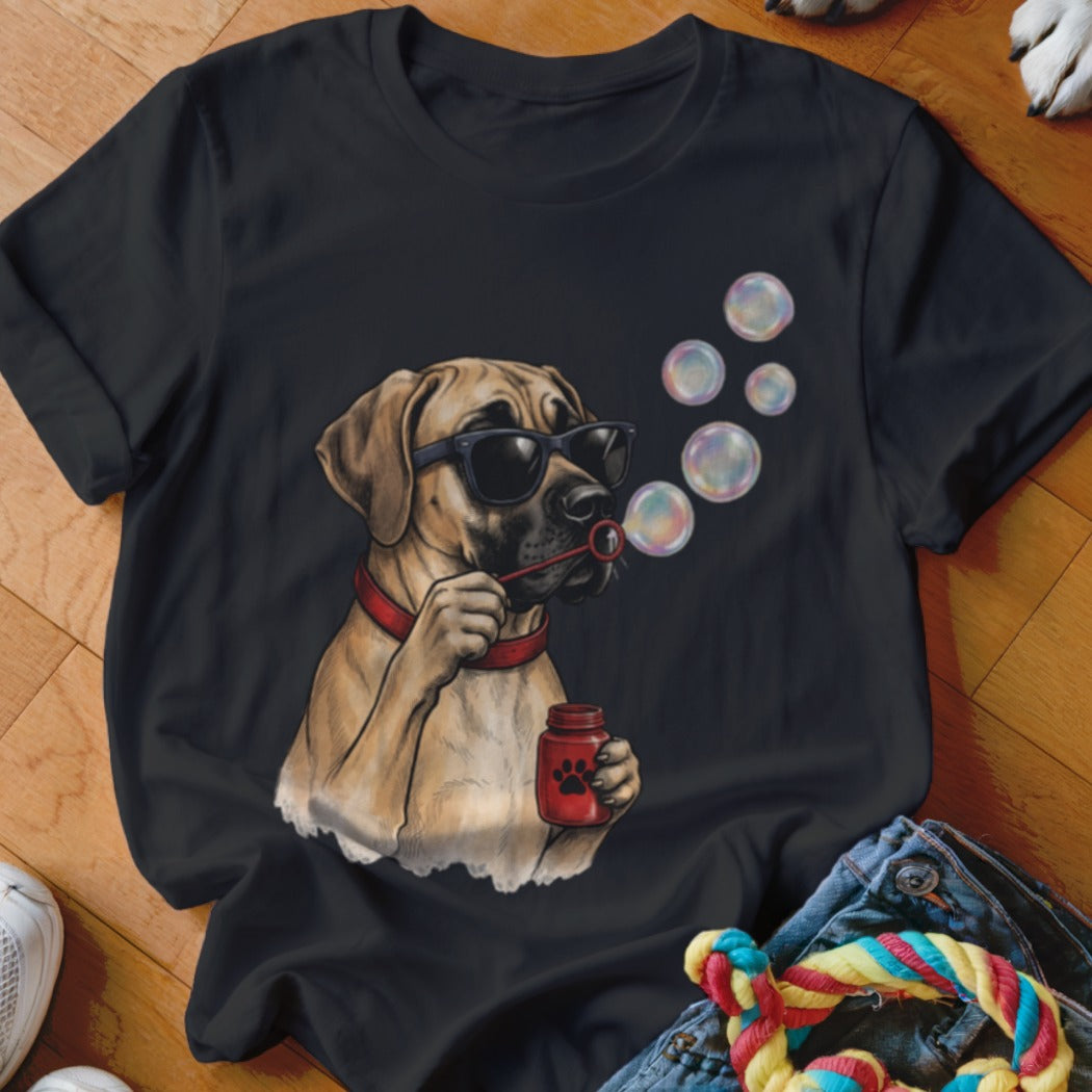 A black t-shirt features a graphic of a dog wearing sunglasses while blowing soap bubbles.