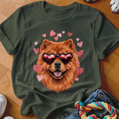Dark green t-shirt featuring a graphic of a fluffy dog wearing heart-shaped sunglasses surrounded by pink hearts.