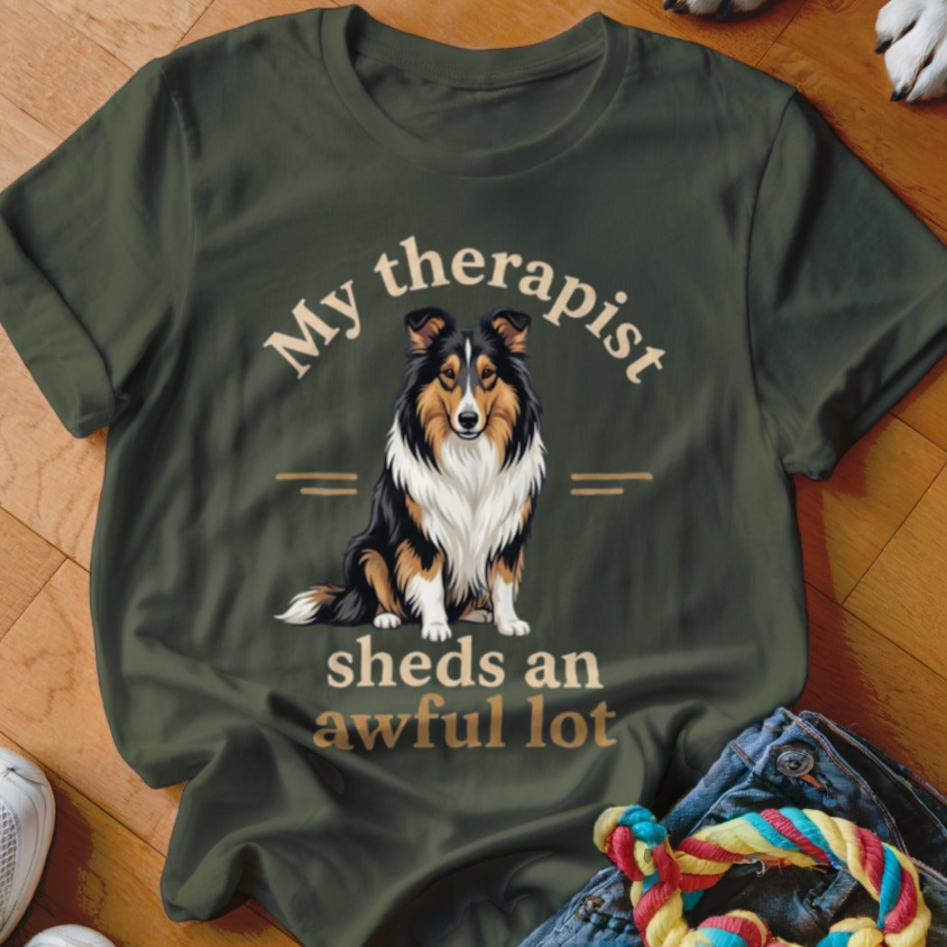 Olive green t-shirt with a Shetland Sheepdog and text "My therapist sheds an awful lot".
