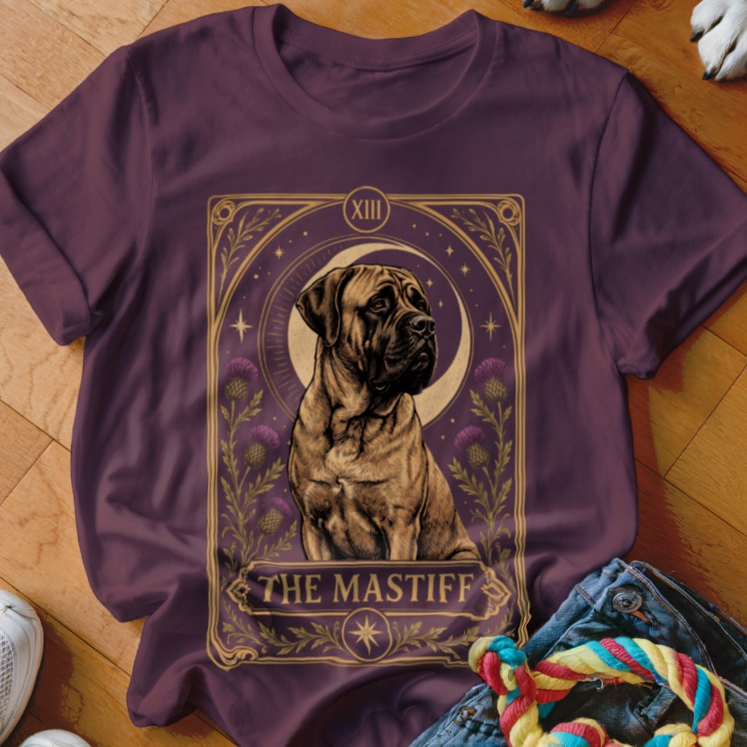 Maroon t-shirt featuring a tarot card graphic of a mastiff with moon and thistle motifs.