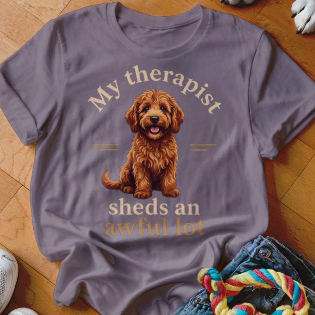 T-shirt with brown curly dog and text "My therapist sheds an awful lot".