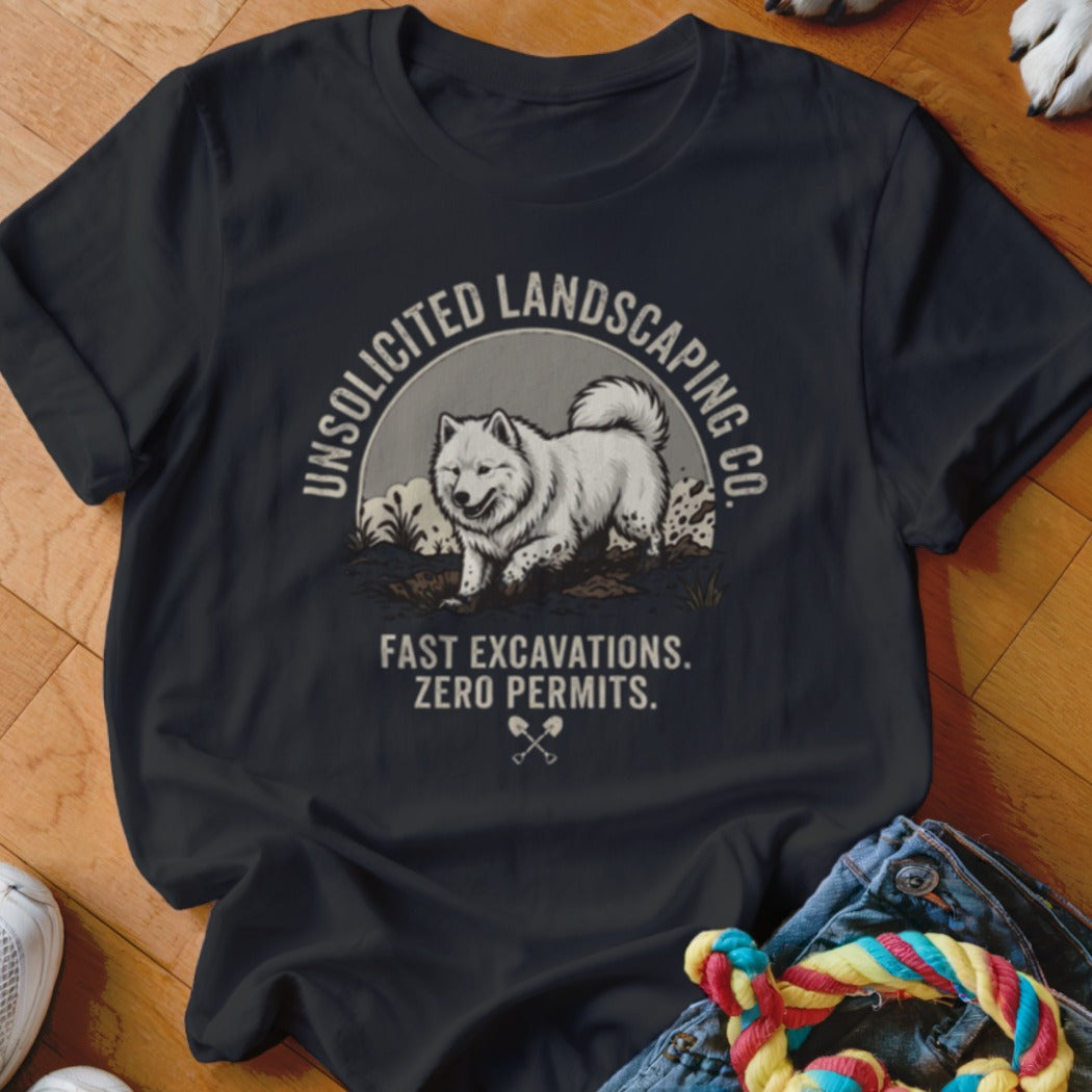 T-shirt with a graphic of a fluffy white dog digging with text "Unsolicited Landscaping Co. Fast Excavations. Zero Permits."