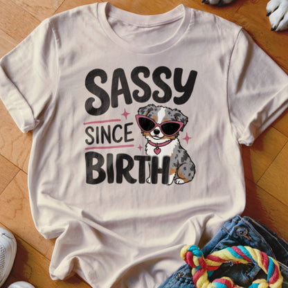 Cream t-shirt with "Sassy Since Birth" text and a dog wearing sunglasses.