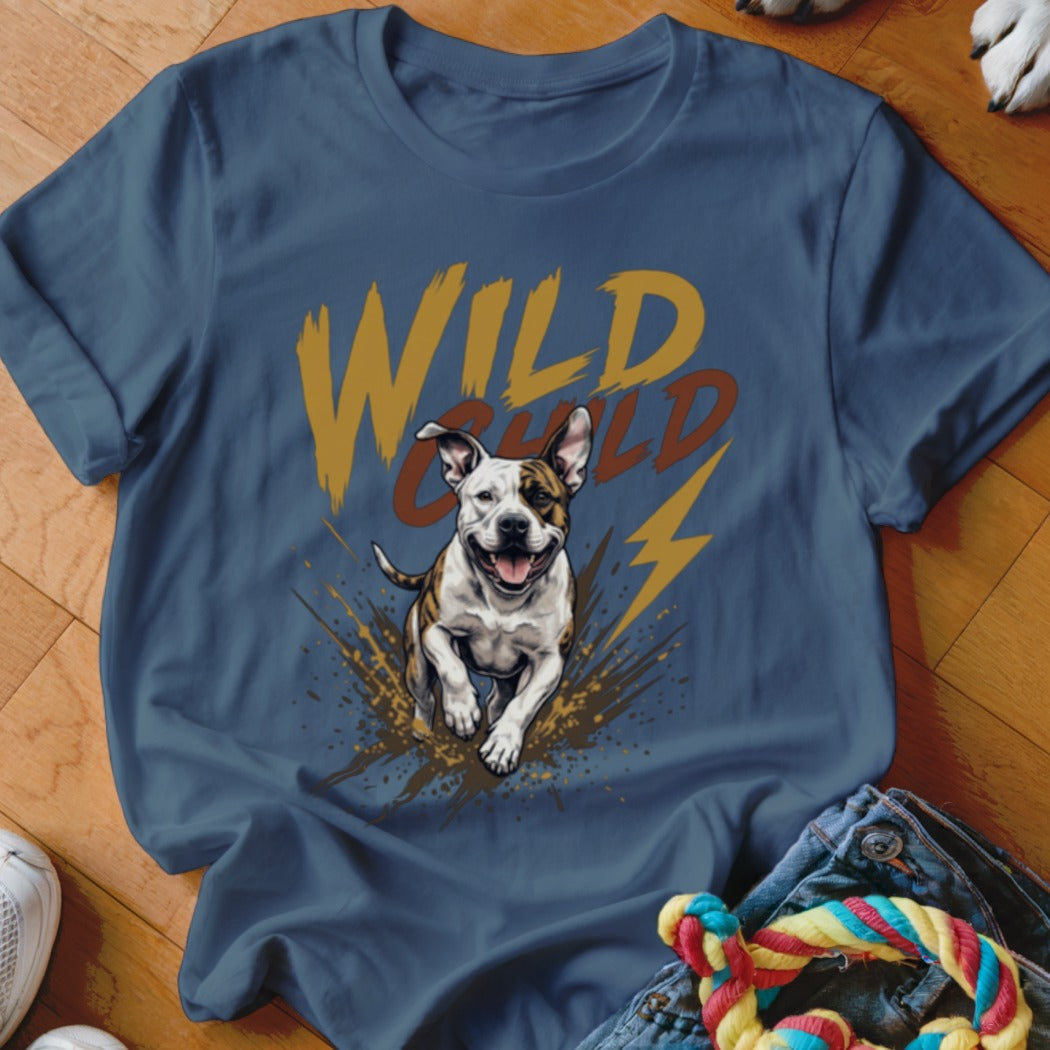 A blue t-shirt featuring a graphic of a running dog, mud splatters, lightning bolts, and the text WILD CHILD.