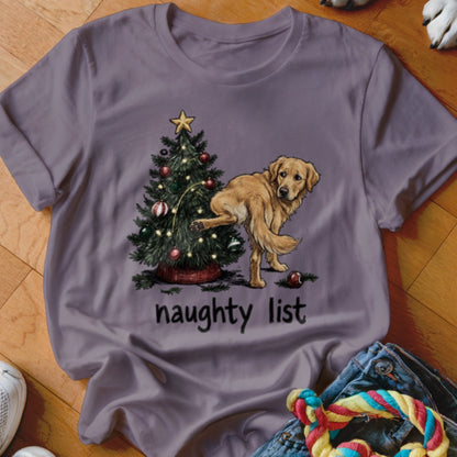 Golden retriever near Christmas tree with text "naughty list"