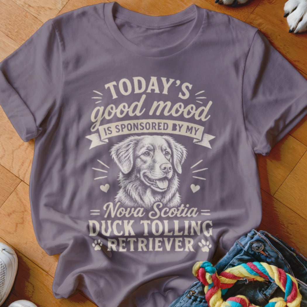 Purple t-shirt with "Today's good mood is sponsored by my Nova Scotia Duck Tolling Retriever" text and dog graphic.