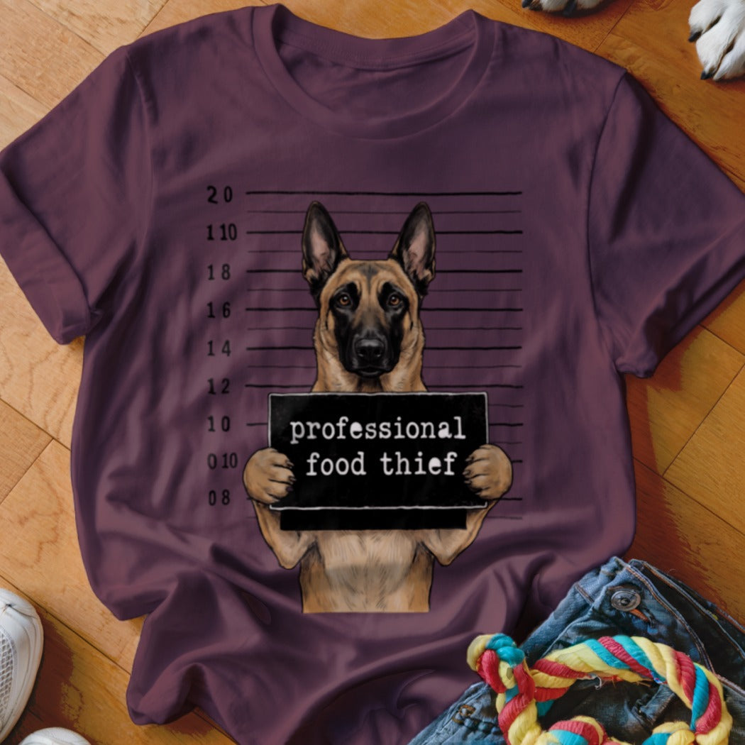 German Shepherd mugshot graphic with "professional food thief" text on t-shirt.