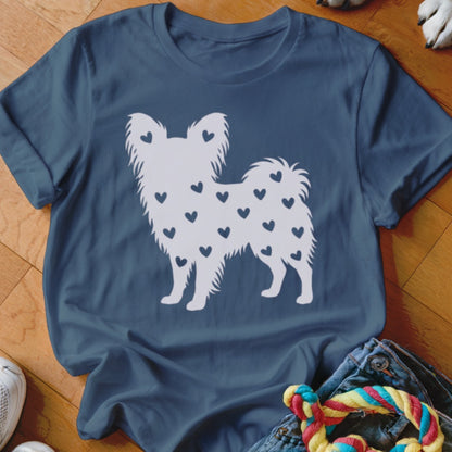 White dog silhouette with dark blue hearts on a navy t-shirt.