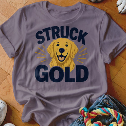 Short-sleeve t-shirt with a golden retriever graphic and text "STRUCK GOLD."