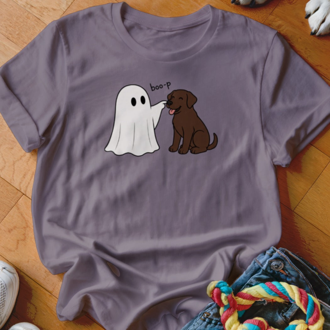 Illustration of a ghost booping a chocolate lab puppy on the nose with "boo-p" text.