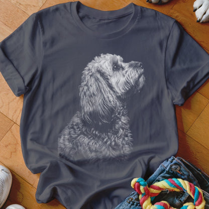 Dark grey t-shirt with a black and white drawing of a fluffy dog.