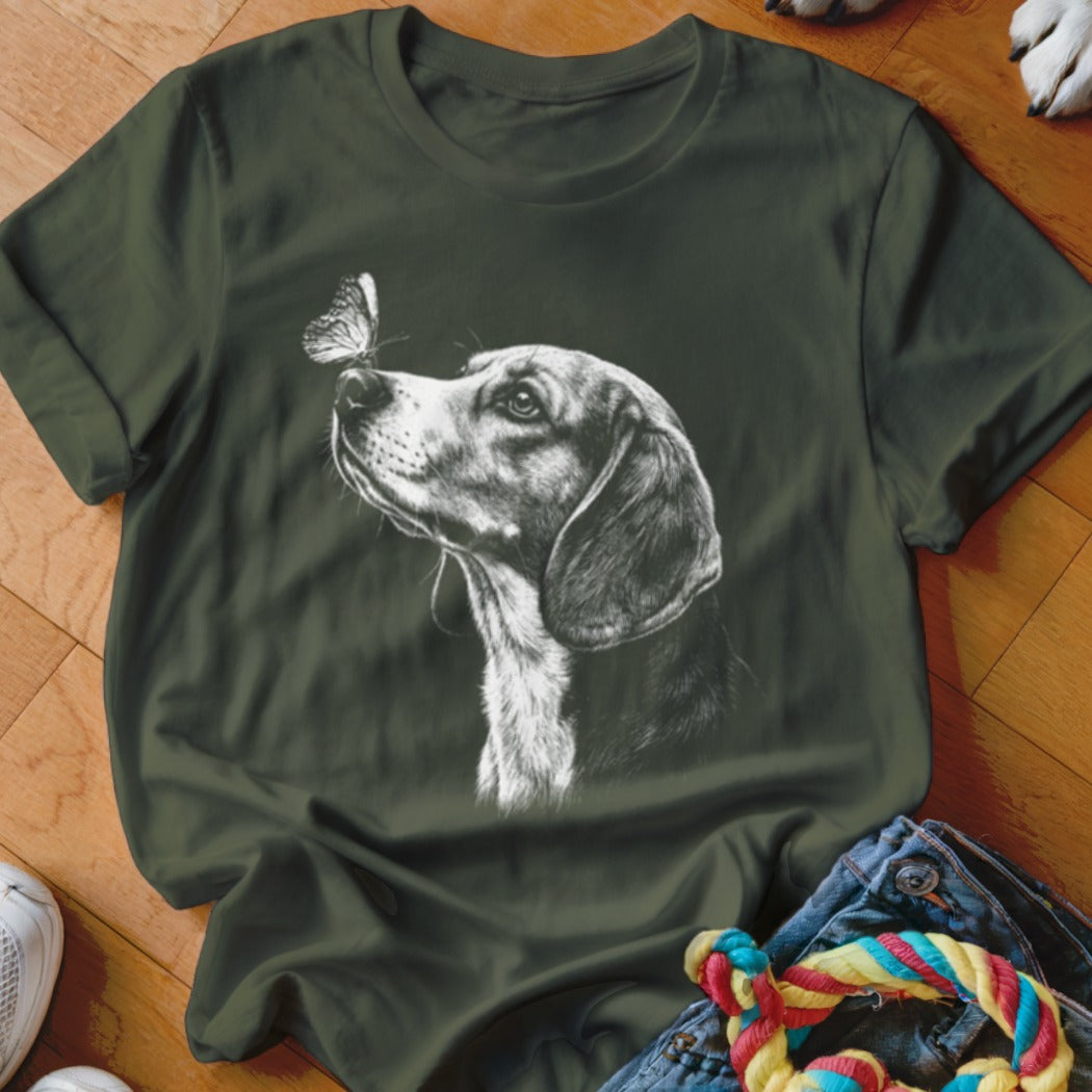 Dark green crewneck t-shirt featuring a white sketch graphic of a hound dog with a butterfly on its nose.