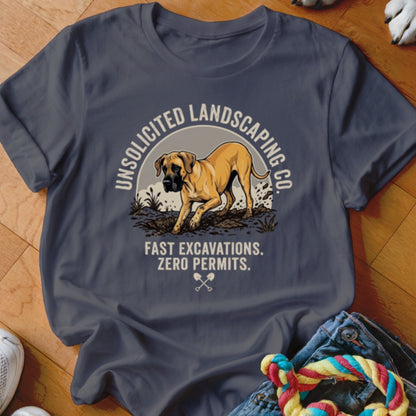 T-shirt graphic with dog digging dirt, "Unsolicited Landscaping Co. Fast Excavations. Zero Permits."