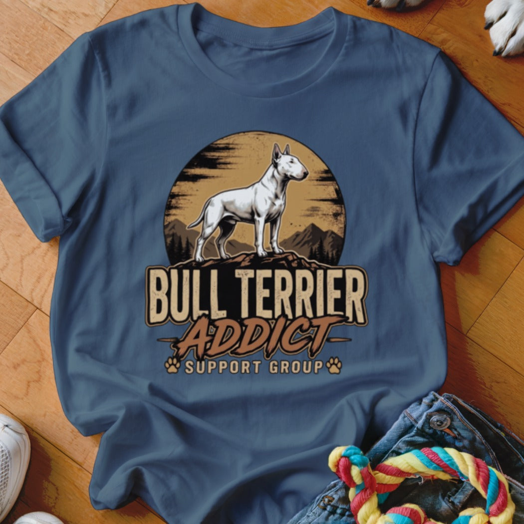 Dark blue crewneck t-shirt featuring a graphic of a Bull Terrier standing on a mountain against a sunset, with text reading Bull Terrier Addict Support Group.