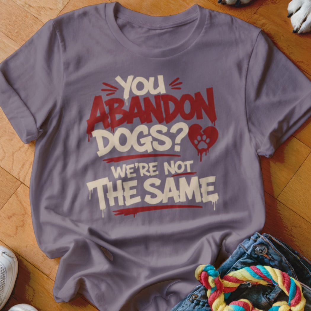 Purple t-shirt with text "YOU ABANDON DOGS? WE'RE NOT THE SAME".