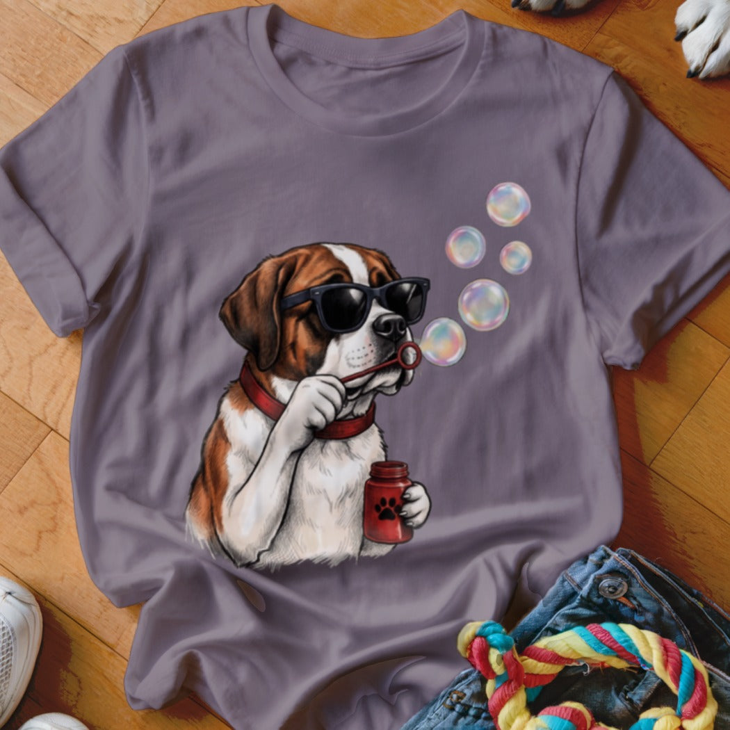 A grey crewneck t-shirt featuring a graphic of a Saint Bernard dog wearing sunglasses and blowing bubbles.