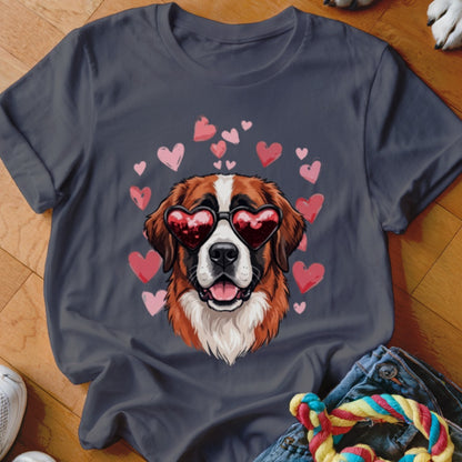 A dark gray t-shirt featuring a Saint Bernard dog wearing heart-shaped sunglasses surrounded by pink hearts.
