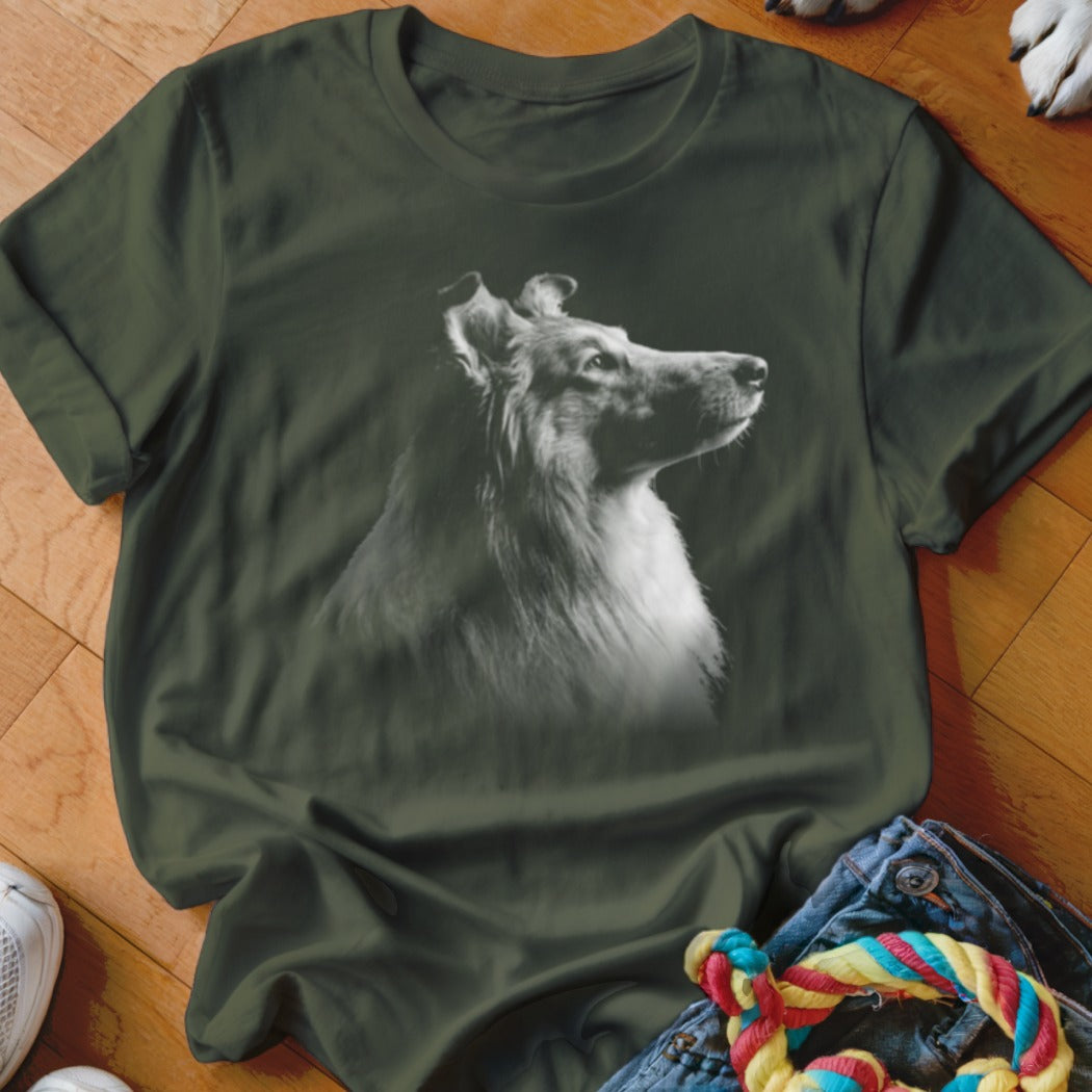 Green t-shirt with a black and white profile of a rough collie dog.
