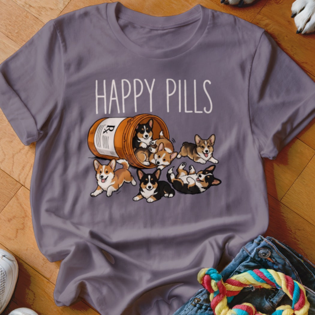 T-shirt with "Happy Pills" text and cartoon corgis spilling from a pill bottle.