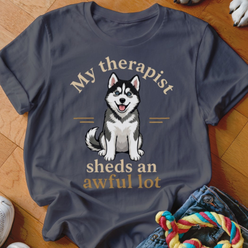 Dark grey t-shirt with a husky graphic and text "My therapist sheds an awful lot".