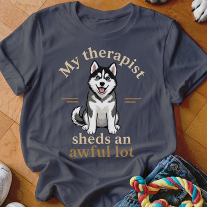 Dark grey t-shirt with a husky graphic and text "My therapist sheds an awful lot".