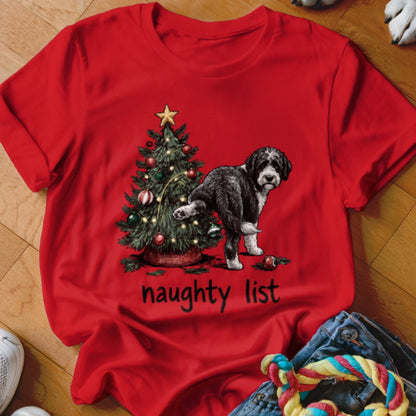 Black and white dog next to a Christmas tree with "naughty list" text.