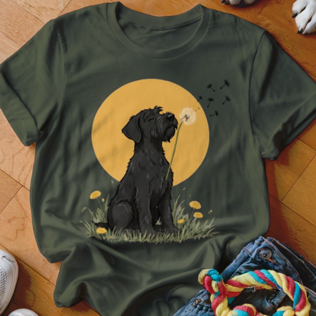 Dark green t-shirt featuring an illustration of a black dog blowing a dandelion seed head.