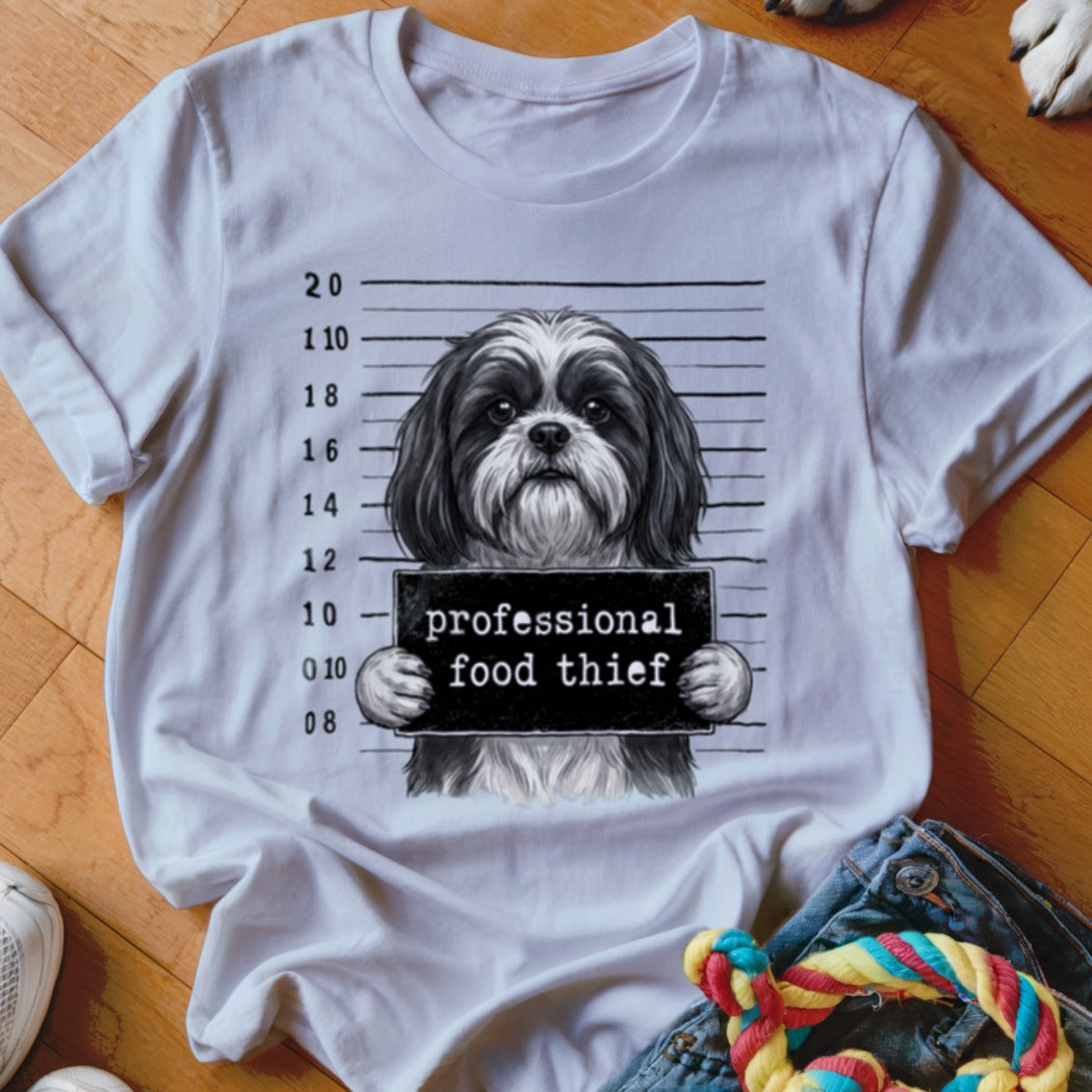 White t-shirt with a Shih Tzu mugshot graphic that says "professional food thief".