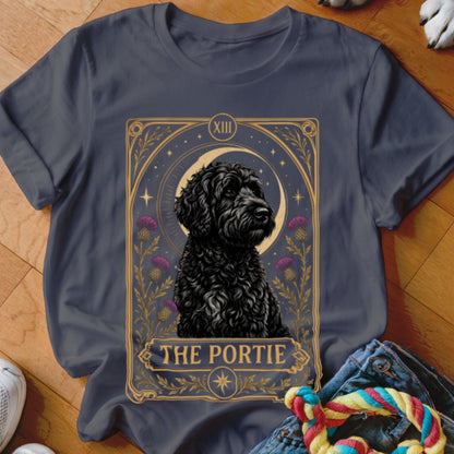 Charcoal gray t-shirt featuring a tarot card graphic of a black dog with the text The Portie.