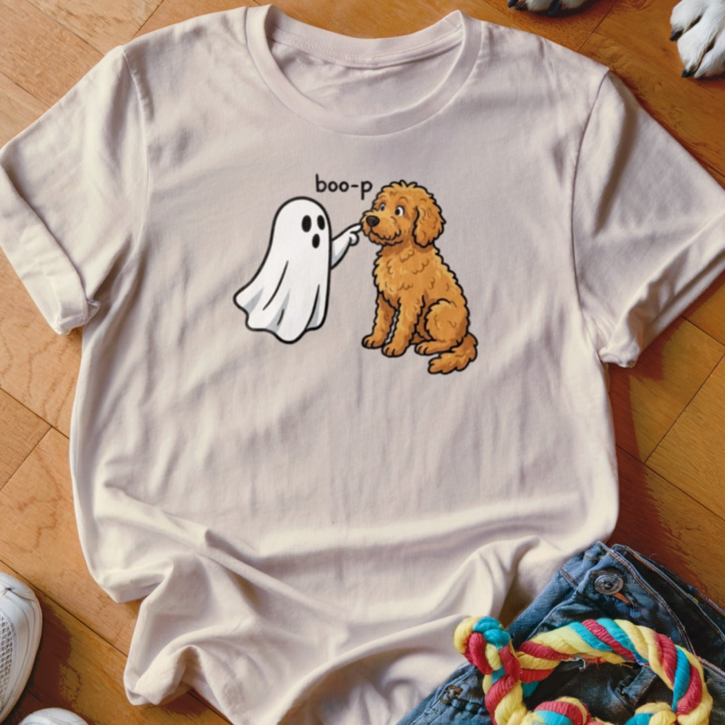 Ghost booping dog with text "boo-p" on light-colored t-shirt