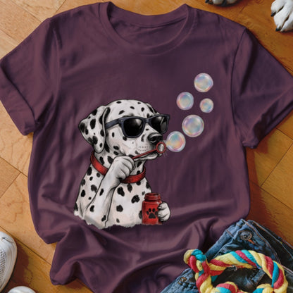 Dark maroon t-shirt featuring a graphic of a Dalmatian wearing sunglasses and blowing soap bubbles.