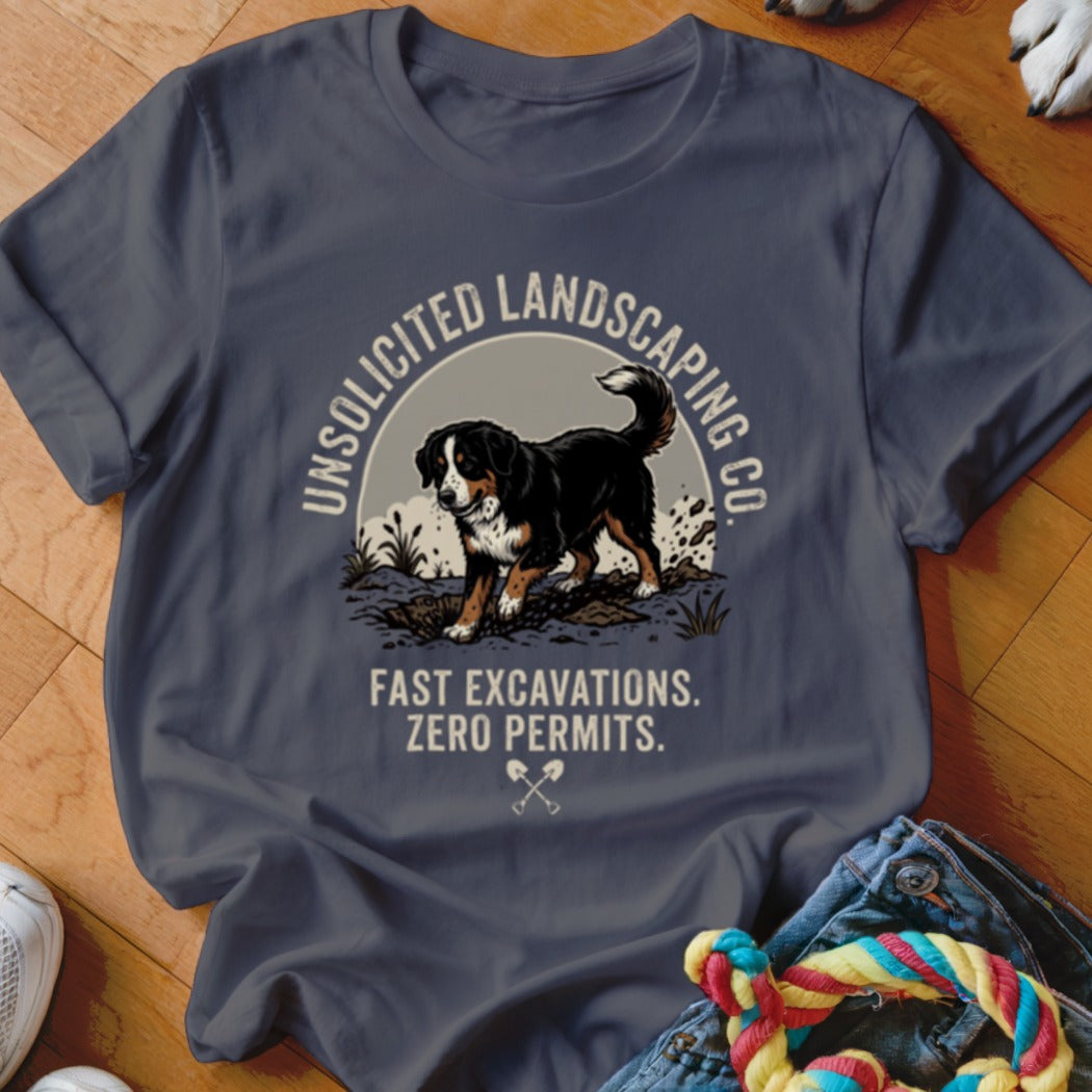 Bernese Mountain Dog graphic on t-shirt with text "UNSOLICITED LANDSCAPING CO." and "FAST EXCAVATIONS. ZERO PERMITS."