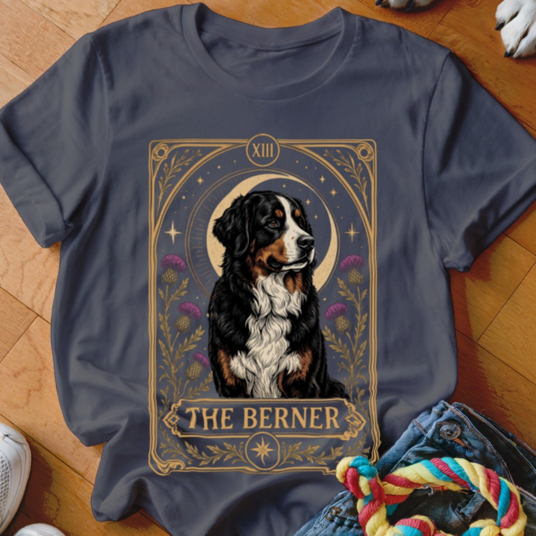 Dark grey t-shirt featuring a tarot card style graphic of a Bernese Mountain Dog with the text The Berner.