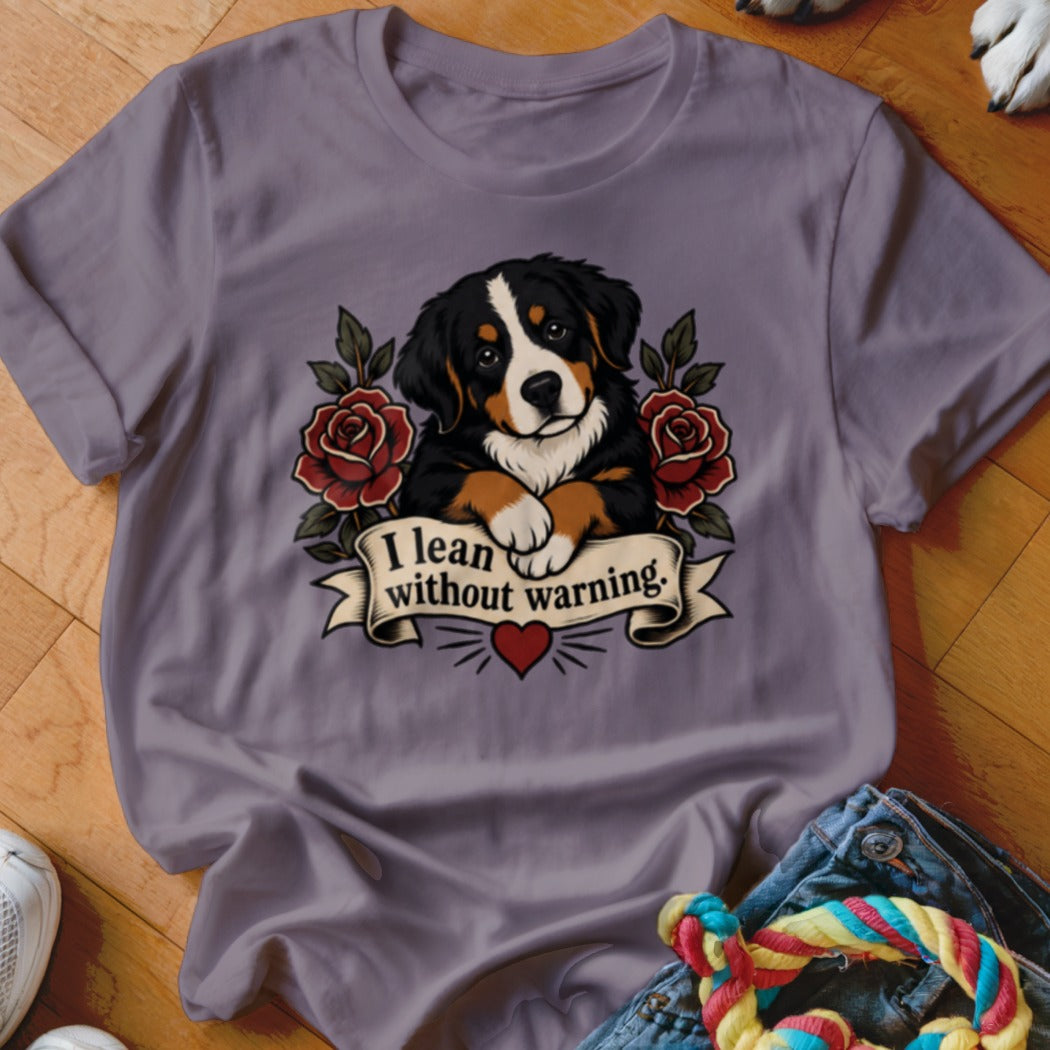Bernese Mountain Dog with roses, banner reads "I lean without warning."