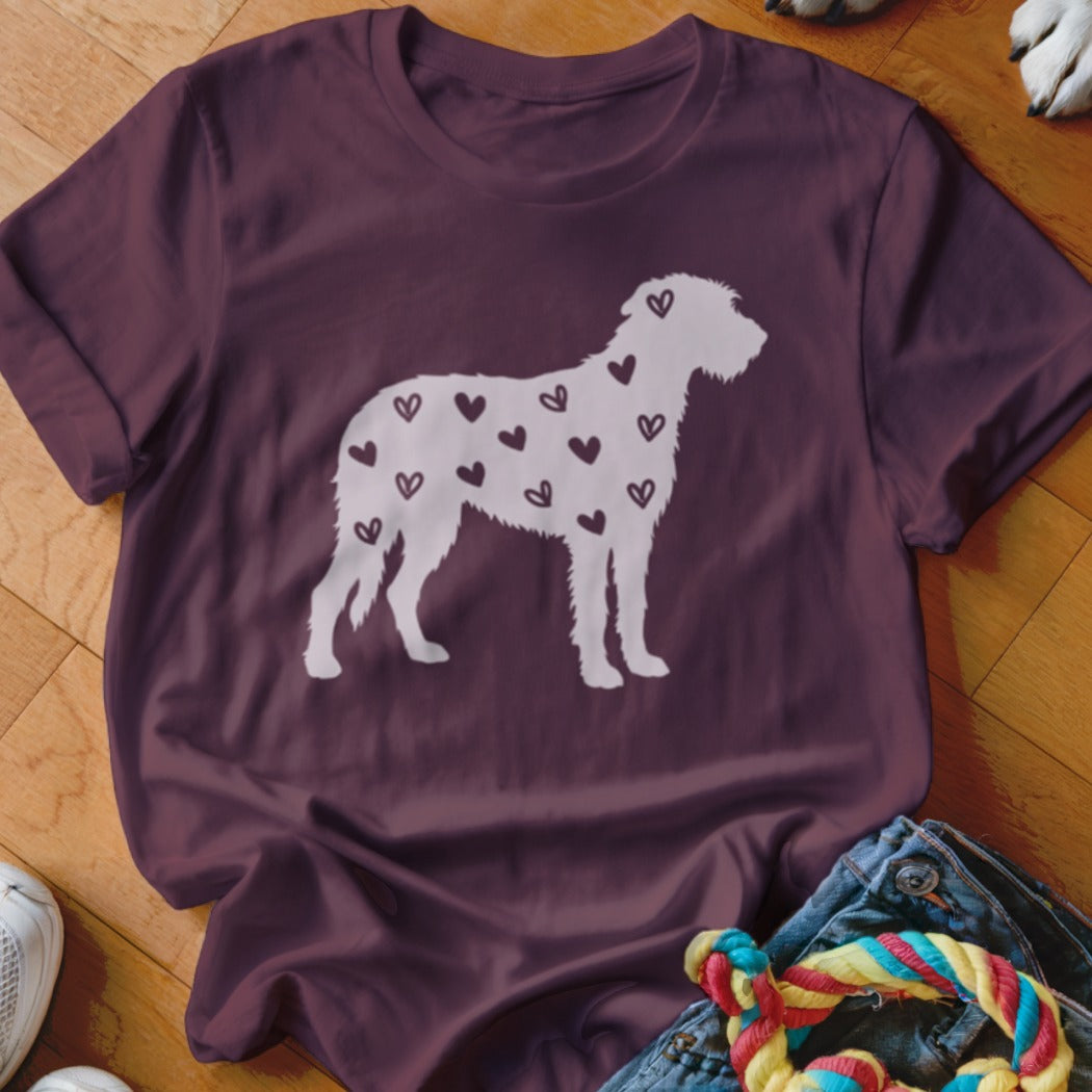 Maroon t-shirt with white dog silhouette filled with small hearts.