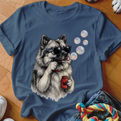 A dark blue crewneck t-shirt featuring a graphic of a fluffy dog wearing sunglasses and blowing bubbles.