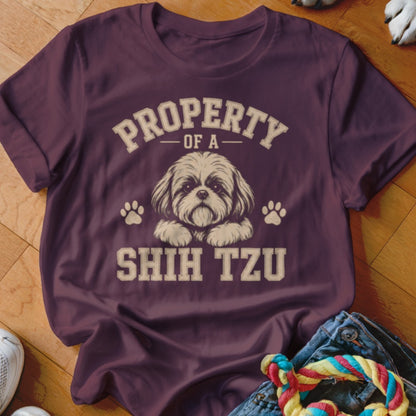 Maroon t-shirt with "Property of a Shih Tzu" and dog illustration.