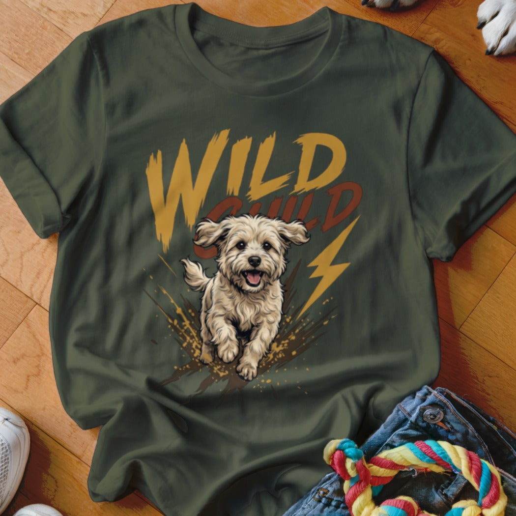 Olive green t-shirt featuring a graphic of a running fluffy dog, mud splatters, and text reading WILD CHILD.