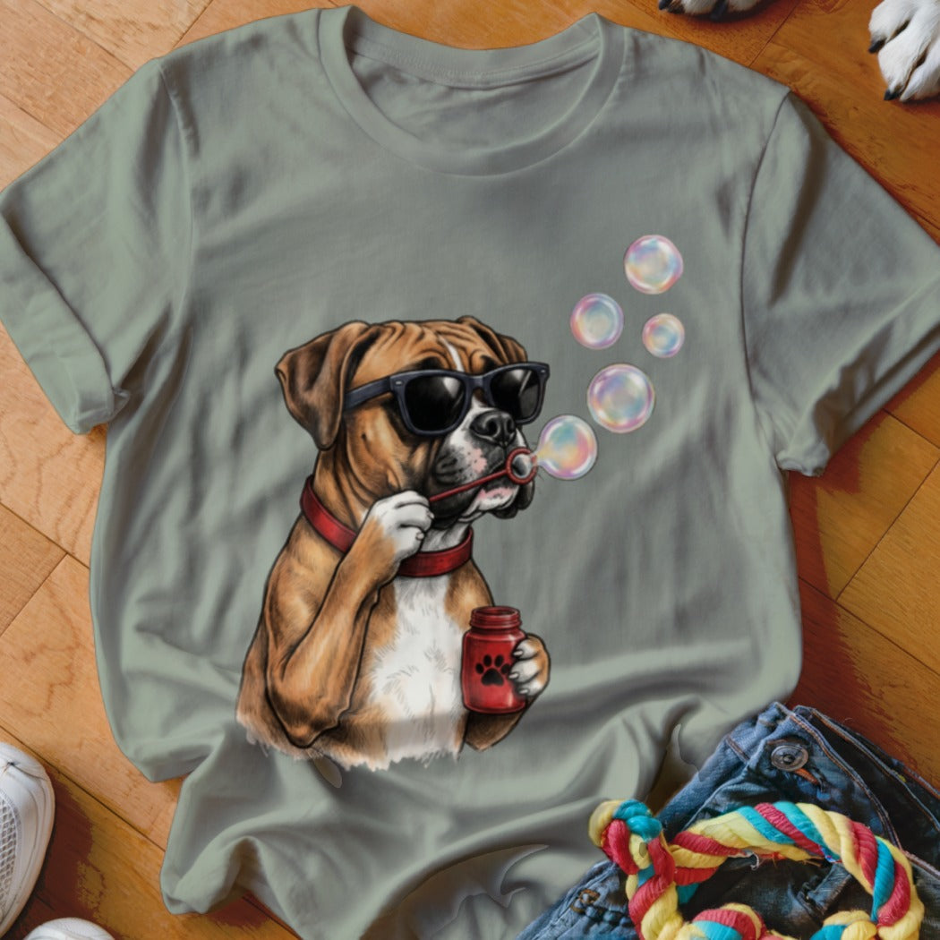 Gray t-shirt featuring a graphic of a boxer dog wearing sunglasses and blowing soap bubbles.