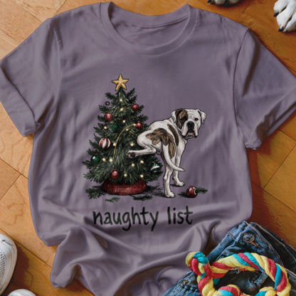 Bulldog next to a Christmas tree with text "naughty list"