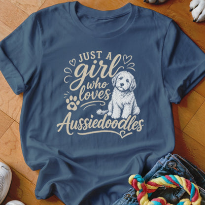 Blue t-shirt with "Just a girl who loves Aussiedoodles" text and doodle illustration.