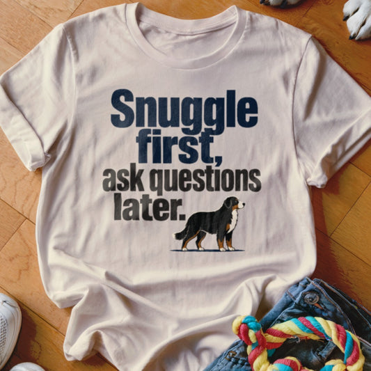 White t-shirt with "Snuggle first, ask questions later." text and a Bernese Mountain Dog.