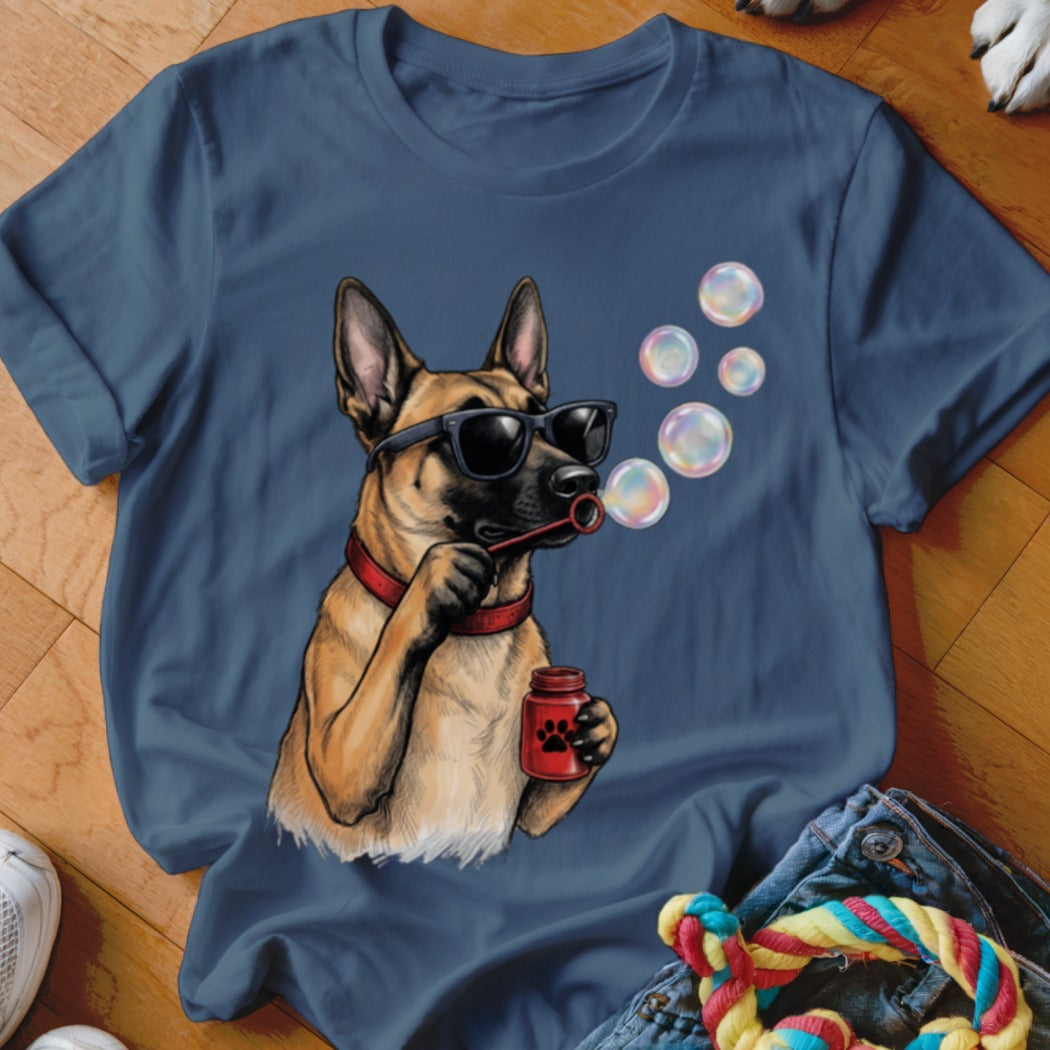 A dark blue t-shirt printed with a German Shepherd wearing sunglasses and blowing soap bubbles.