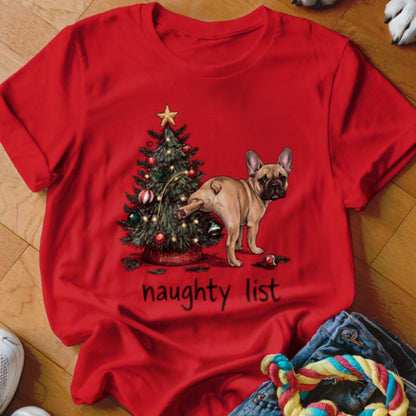 French Bulldog by Christmas tree with "naughty list" text.